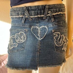 Blue Distressed Denim Mini Skirt with Frayed Heart Pocket Detail